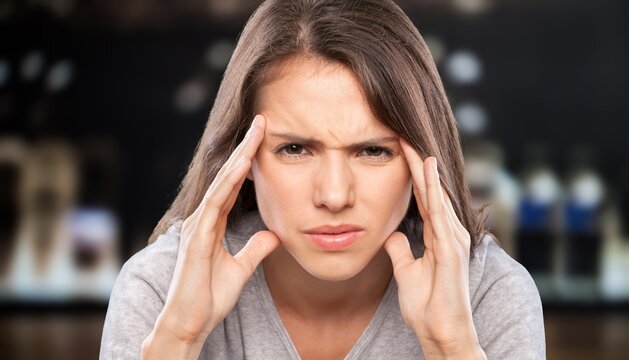 Healthcare concept, woman hand on face as suffering from facial pain, mumps or toothache