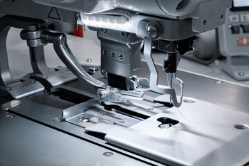 sewing machine and item of blue clothing