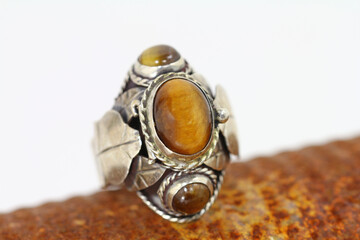 Ring with hiding place for a poison dose for voluntary suicide