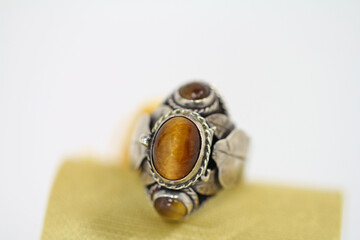 Ring with hiding place for a poison dose for voluntary suicide