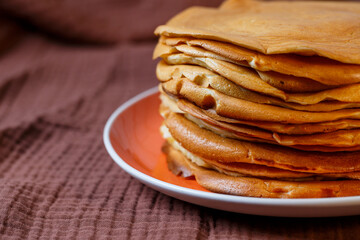 Delicious homemade fried pancakes with natural ingredients, plate with homemade pancakes