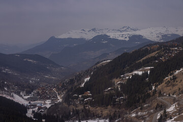 Overview of the valley of Meribel looking from the hills above. Houses and villages in french alps around Meribel and Courchevel.