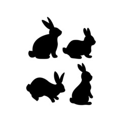 Set of black silhouettes of Easter bunnies. Cute hand drawn vector illustration. Isolated white background. For Easter decor, scrapbooks, invitations and cards