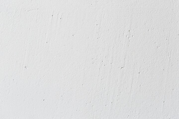 White putty texture on the wall, the stage of repair in the apartment, preparing the walls for...