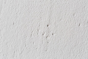 White putty texture on the wall, the stage of repair in the apartment, preparing the walls for painting