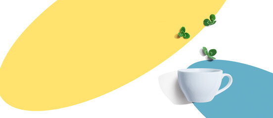 Shamrock leaves with coffee cup - flat lay