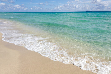 Turquoise waters on empty beach