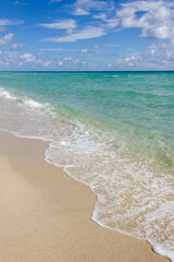 Turquoise waters on empty beach 2