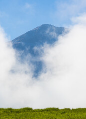 Mount Txindoki among the clouds in the Natural Park of the Aralar Mountains, Euskadi