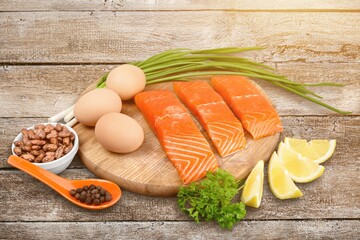 Fresh fish fillet. On a wooden background.