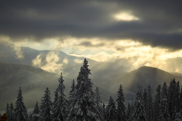 The sun's rays on the slopes of the mountains