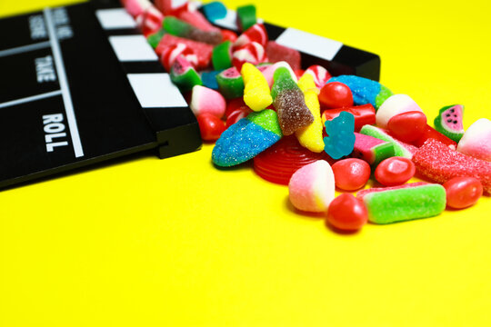 movie clapperboard with candy