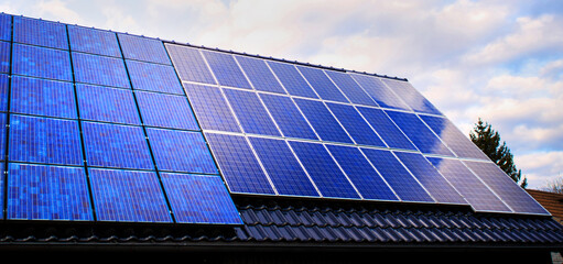 different solar modules on a roof panorama