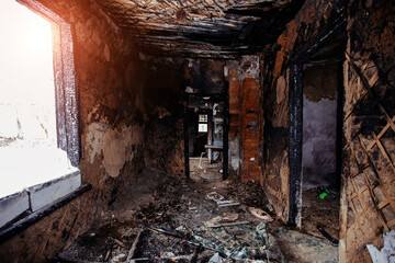 Burnt house interior. Consequences of fire or war