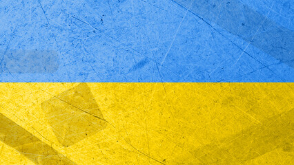 Texture of the military flag of Ukraine with patches and abrasions. Pain in the heart of Ukrainians. Blue and yellow flag.