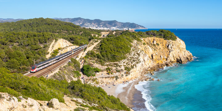 Civia regional train operated by RENFE Rodalies de Catalunya near Sitges in Spain