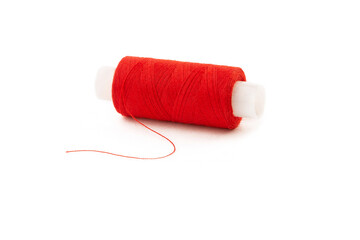 Spool of red threads on a white isolated background.