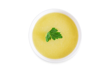 Potato cauliflower puree soup in a bowl on a white isolated background