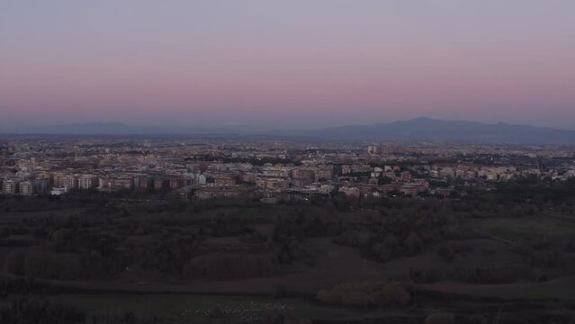 drone shot travelling of Roma at sunet, italia , Roma
