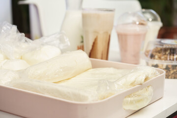 Tray with products and traditional Nicaraguan food such as cheese, quesillo, yogurt, sour cream and other objects that are presented during a television program