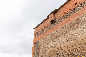 brick wall of an old castle with toilet room