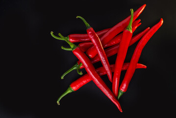 Chili on black isolated background. Hot chili peppers whole  natural  red Full depth of field , Chili Clipping Path