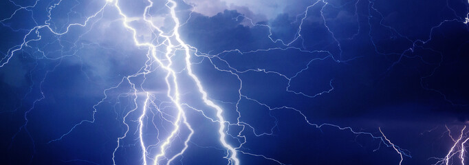 Thunder, lightnings and rain on stormy summer night