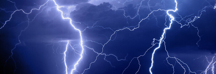 Thunder, lightnings and rain on stormy summer night