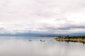 Panoramic view of the Cabra Corral reservoir with boats in Salta, Argentina
