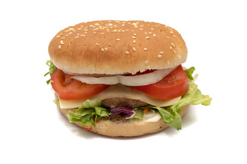 A hamburger, with the ingredients, lettuce, cabbage, cucumber, tomato, onion, cheese, ketchup, mayonnaise. Isolated on white background. One of the most consumed snacks in the world.