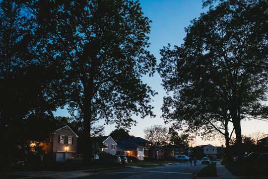 A Suburban Street At Dusk.