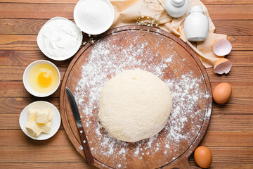 Preparing of lazy dumplings on wooden background