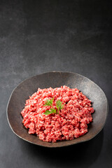 Raw ground beef ready for preparation.