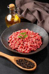 Raw ground beef ready for preparation.