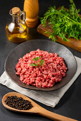 Raw ground beef ready for preparation.