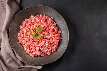 Raw ground beef ready for preparation.