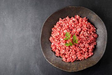 Raw ground beef ready for preparation.