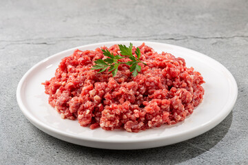 Raw ground beef ready for preparation.