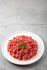 Raw ground beef ready for preparation.