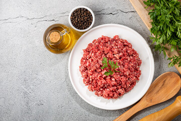 Raw ground beef ready for preparation.
