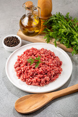 Raw ground beef ready for preparation.