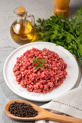 Raw ground beef ready for preparation.