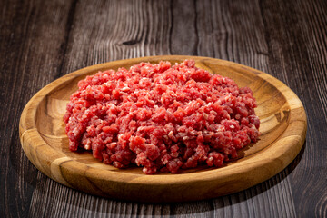 Raw ground beef ready for preparation.