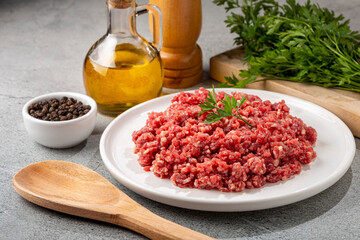 Raw ground beef ready for preparation.