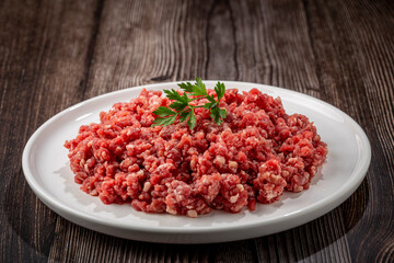 Raw ground beef ready for preparation.