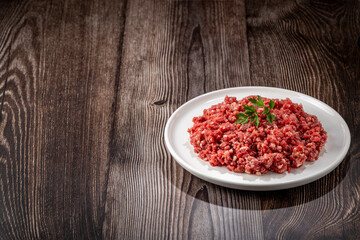 Raw ground beef ready for preparation.