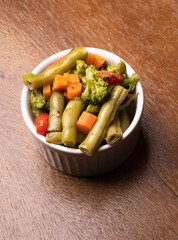 vegetable bowl on wooden background