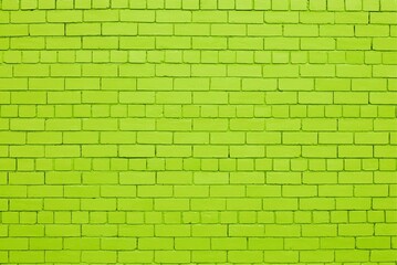 Lime color painted brick wall background.