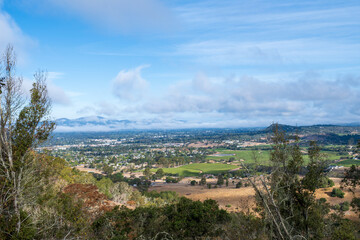 Fototapeta na wymiar View of the Napa Valley from the Skyline wilderness park, California, USA, with blue sky copy-space