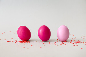 Painted eggs for Easter celebration on color background